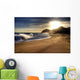 Wave on beach with sun shining. Wall Mural