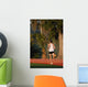 Vertical of Man Running in Sun Wall Mural