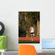 Vertical of Man Running in Sun Wall Mural