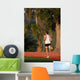 Vertical of Man Running in Sun Wall Mural