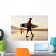 A Man Walking With His Surfboard On Valdevaqueros Beach Wall Mural