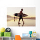 A Man Walking With His Surfboard On Valdevaqueros Beach Wall Mural