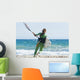 A Woman With Her Kitesurfing Board Walking Into The Water Wall Mural