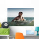 A Man With His Surfboard In The Water Wall Mural