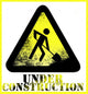 Under construction sign Wall Mural
