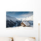 winterscene of alpine valley with snow coverd cabin Wall Mural