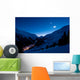 Extreme long exposure of a remote alp valley. Stars in motion. Wall Mural