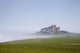 Bamburgh Castle On A Hill In The Fog Wall Mural