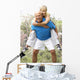 Senior Couple Exercising In Park Wall Mural