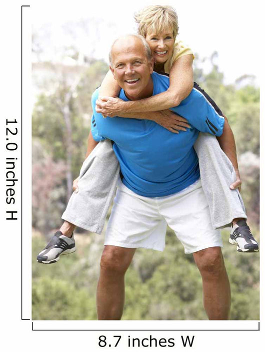 Senior Couple Exercising In Park Wall Mural