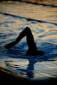 silhouetted swimmer 3 Wall Mural