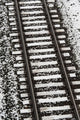 Train Tracks Lightly Covered With Snow Wall Mural