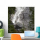 Water Cascading Down The Rock And Forming A Mist Wall Mural