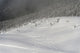 Skiers At The Base Of A Mountain Wall Mural