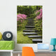 Rock Stairway Along A Moss Covered Hill With Flowering Bushes Wall Mural