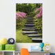 Rock Stairway Along A Moss Covered Hill With Flowering Bushes Wall Mural