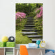 Rock Stairway Along A Moss Covered Hill With Flowering Bushes Wall Mural
