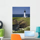 White Lighthouse On The Ocean With Blue Sky And Wildflowers Wall Mural