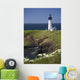 White Lighthouse On The Ocean With Blue Sky And Wildflowers Wall Mural
