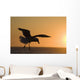 Silhouette Of A Seagull In Flight At Sunset Wall Mural