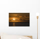 Sun Setting On The Ocean With The Sunlight Reflecting On The Water Wall Mural