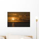 Sun Setting On The Ocean With The Sunlight Reflecting On The Water Wall Mural