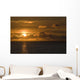 Sun Setting On The Ocean With The Sunlight Reflecting On The Water Wall Mural