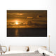 Sun Setting On The Ocean With The Sunlight Reflecting On The Water Wall Mural