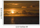 Sun Setting On The Ocean With The Sunlight Reflecting On The Water Wall Mural