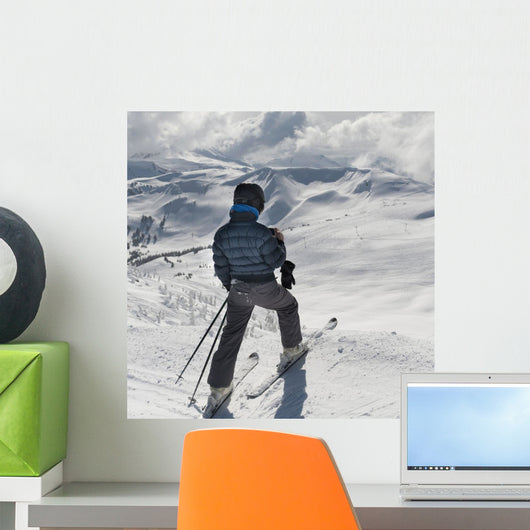 A Skier Pauses On The Trail To Look Out Over The Mountains Wall Mural