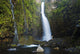 Hawaii, Maui, Nahiku, Woman Standing At Base Of Hanawi Falls Wall Mural
