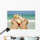 Hawaii, Woman's Hands Holding Seashells, Ocean In Background Wall Mural