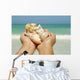 Hawaii, Woman's Hands Holding Seashells, Ocean In Background Wall Mural