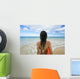 Hawaii, Kauai, Woman Holding Surfboard On Beach, View From Behind Wall Mural