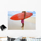 Hawaii, Kauai, Man Holding Surfboard On Beach, View From Side Wall Mural