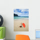 Woman Laying On Beach With Surfboard Wall Mural