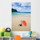 Woman Laying On Beach With Surfboard Wall Mural