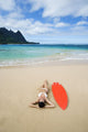 Woman Laying On Beach With Surfboard Wall Mural