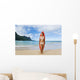 Woman Standing On Beach With Surfboard Wall Mural