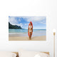 Woman Standing On Beach With Surfboard Wall Mural