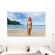 Woman Standing On Beach With Surfboard Wall Mural