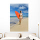 Hawaii, Kauai, Woman Walking Along Beach With Beach With Surfboard Wall Mural
