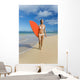 Hawaii, Kauai, Woman Walking Along Beach With Beach With Surfboard Wall Mural