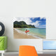 Woman Entering Ocean With Surfboard Wall Mural