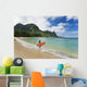 Woman Entering Ocean With Surfboard Wall Mural