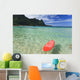 Red Surfboard Floating In Shallow Ocean Wall Mural