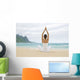 Woman Meditating On Sandy Shore Wall Mural