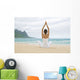 Woman Meditating On Sandy Shore Wall Mural