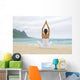 Woman Meditating On Sandy Shore Wall Mural