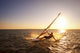 Windsurfer Sailing Off The Coast Of South Maui At Sunset Wall Mural